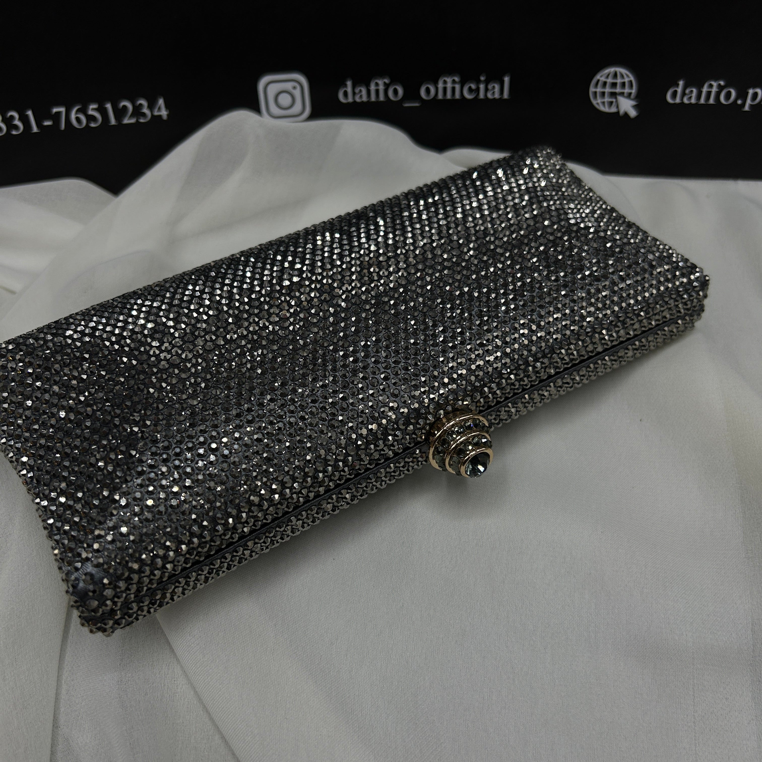 Ladies clutch with swarovski crystals all around 