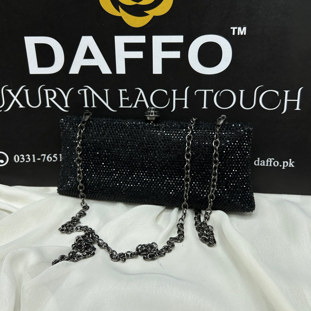 Ladies clutch with swarovski crystals all around 