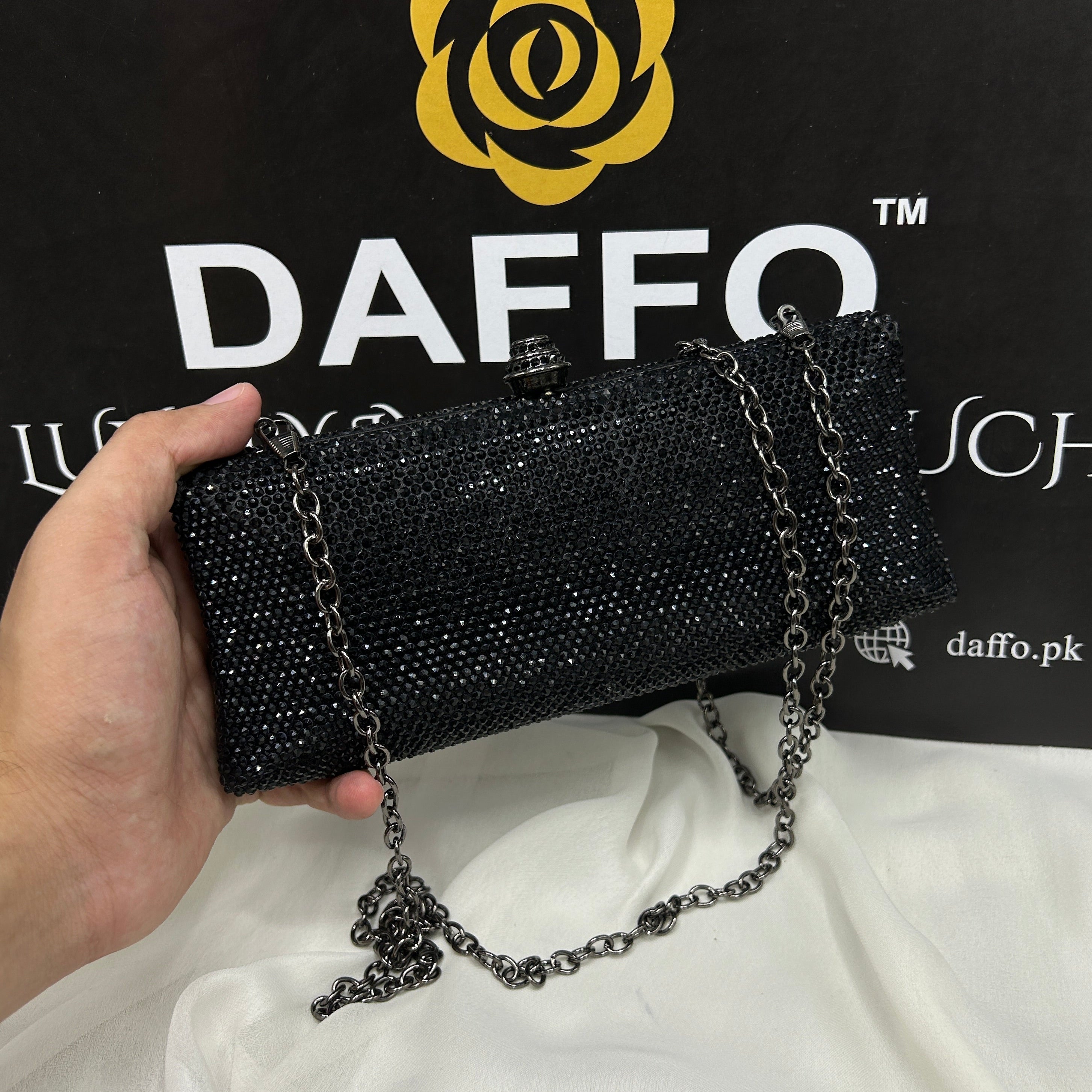 Ladies clutch with swarovski crystals all around 