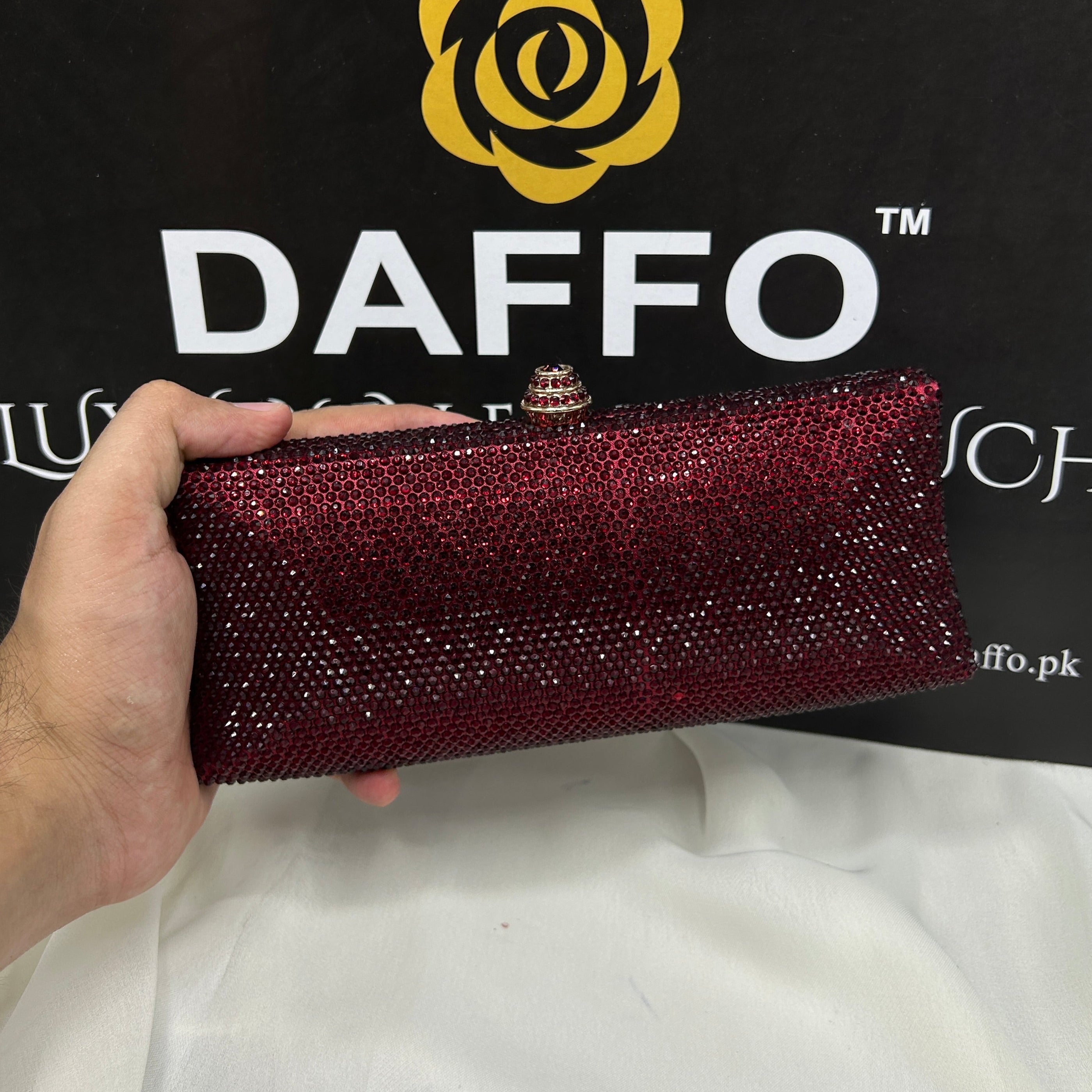 ladies clutch with swarovski crystals all around 