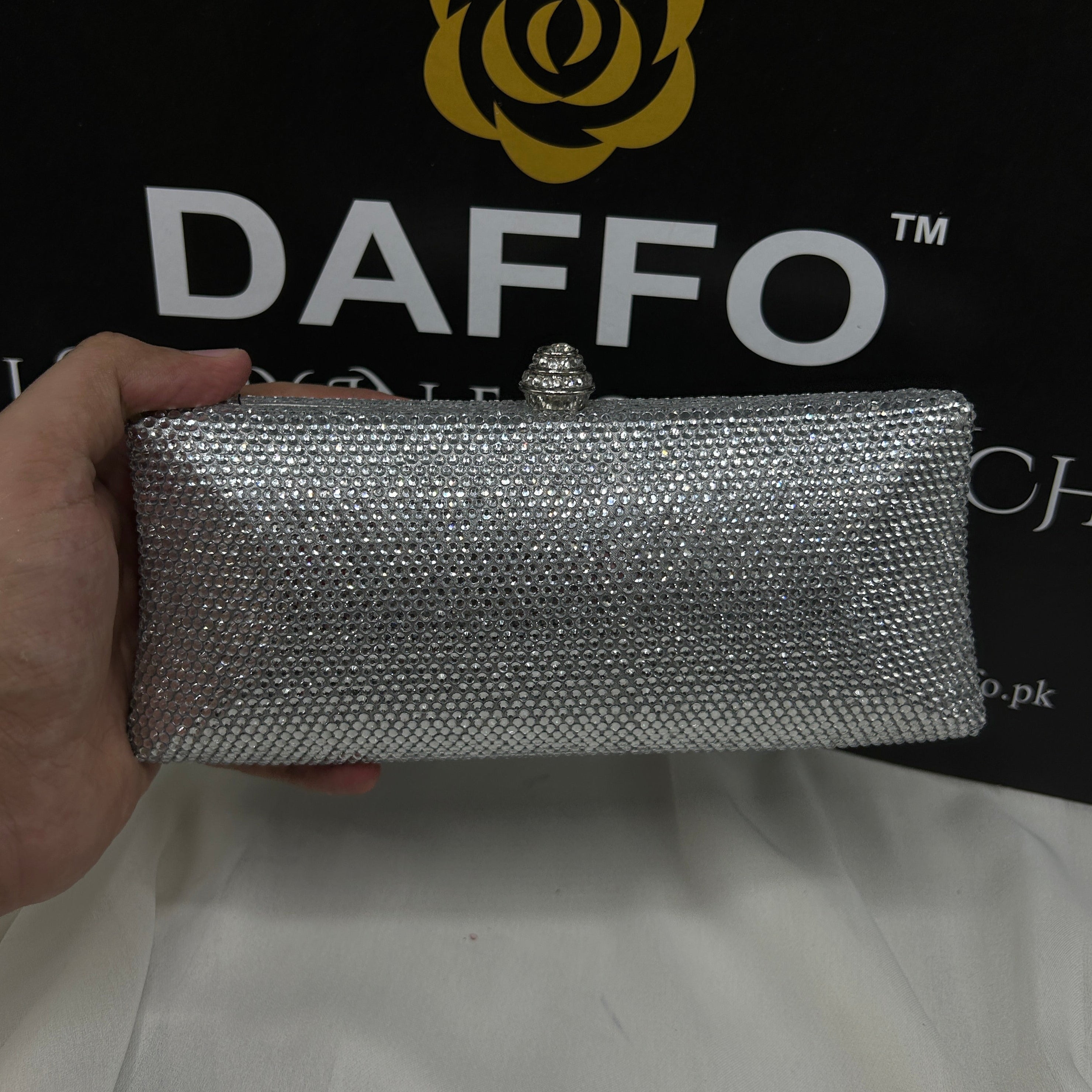 Ladies clutch with swarovski crystals all around 