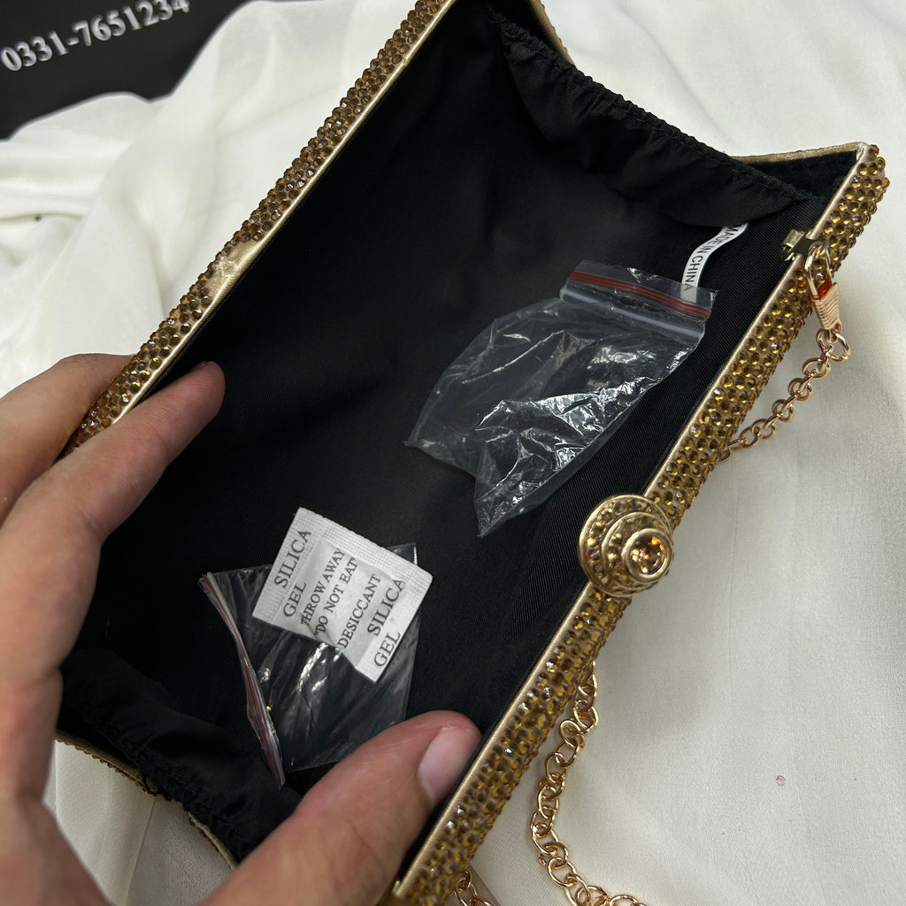 Ladies clutch with swarovski crystals all around 