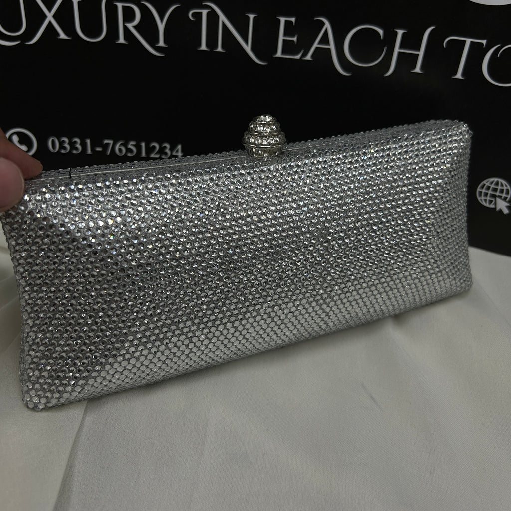 Ladies clutch with swarovski crystals all around 
