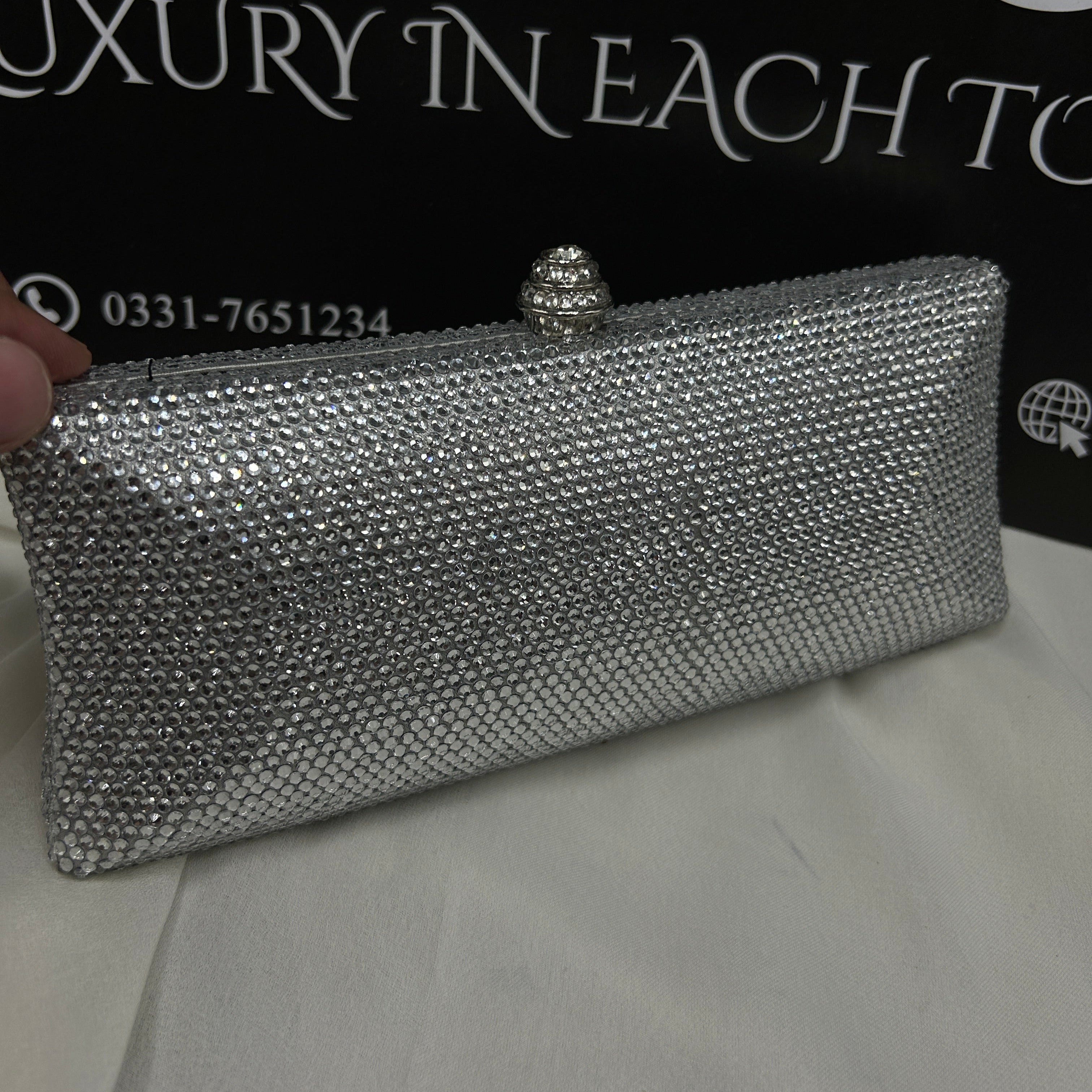 Ladies clutch with swarovski crystals all around 