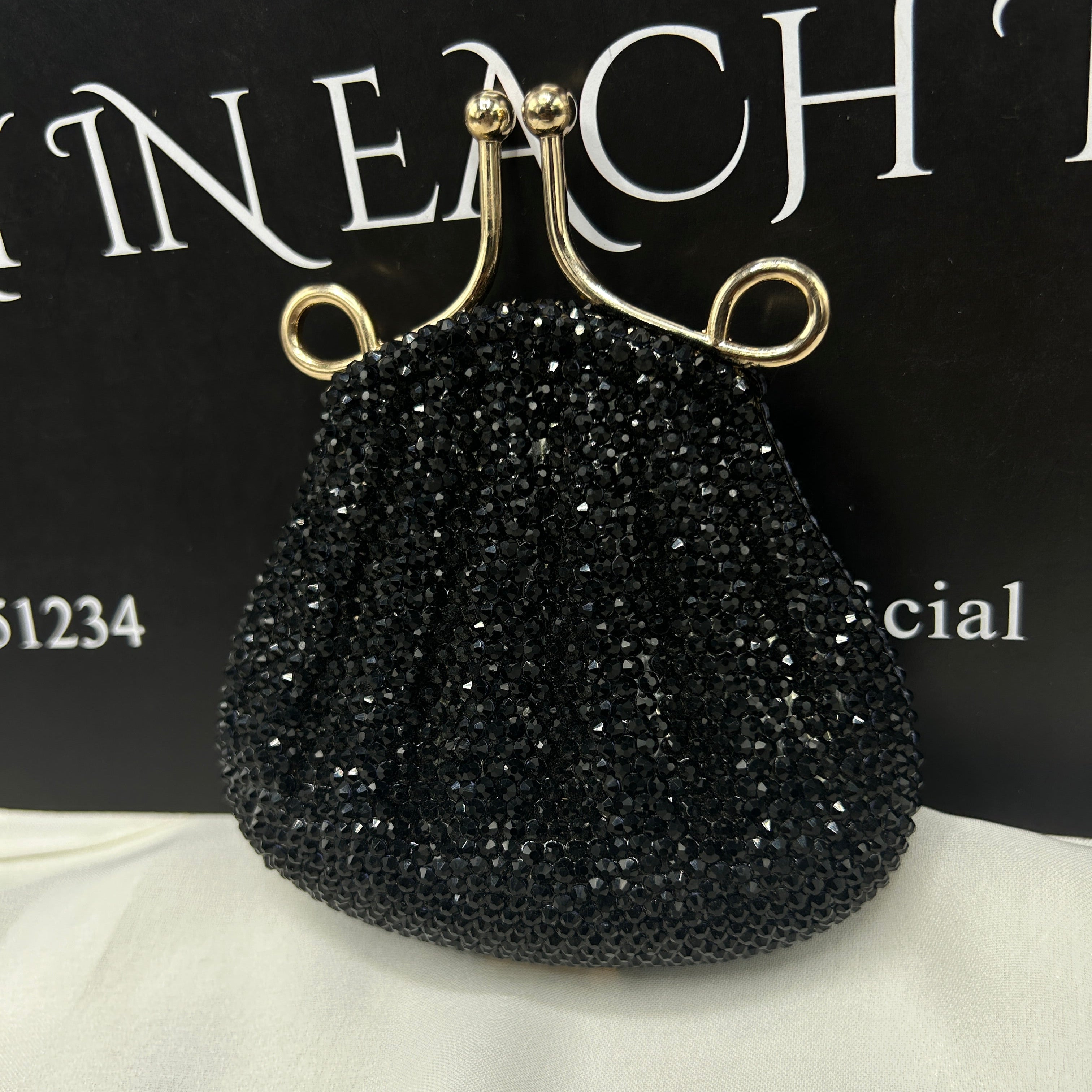 Imported ladies clutch with swarovski crystals 