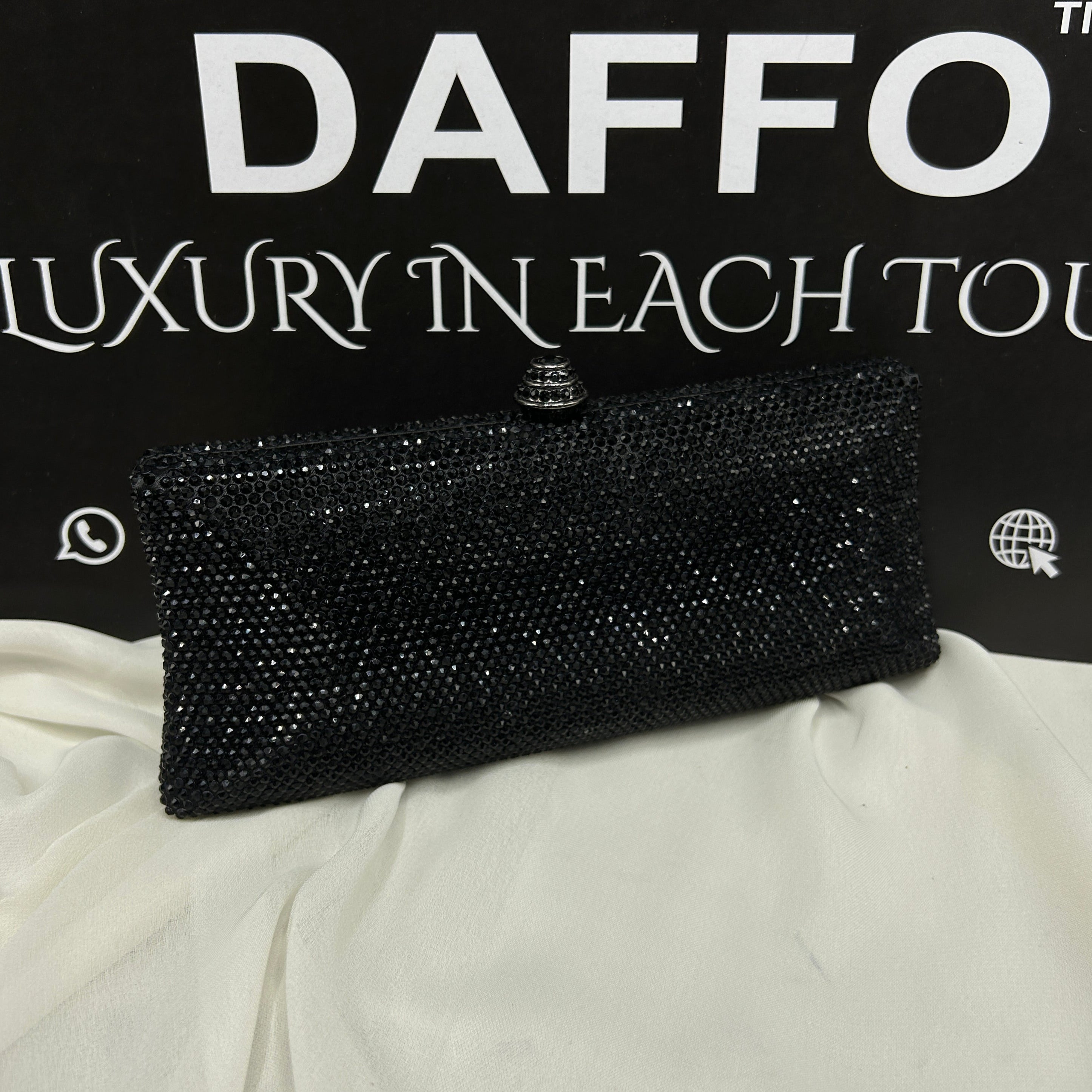 Ladies clutch with swarovski crystals all around 