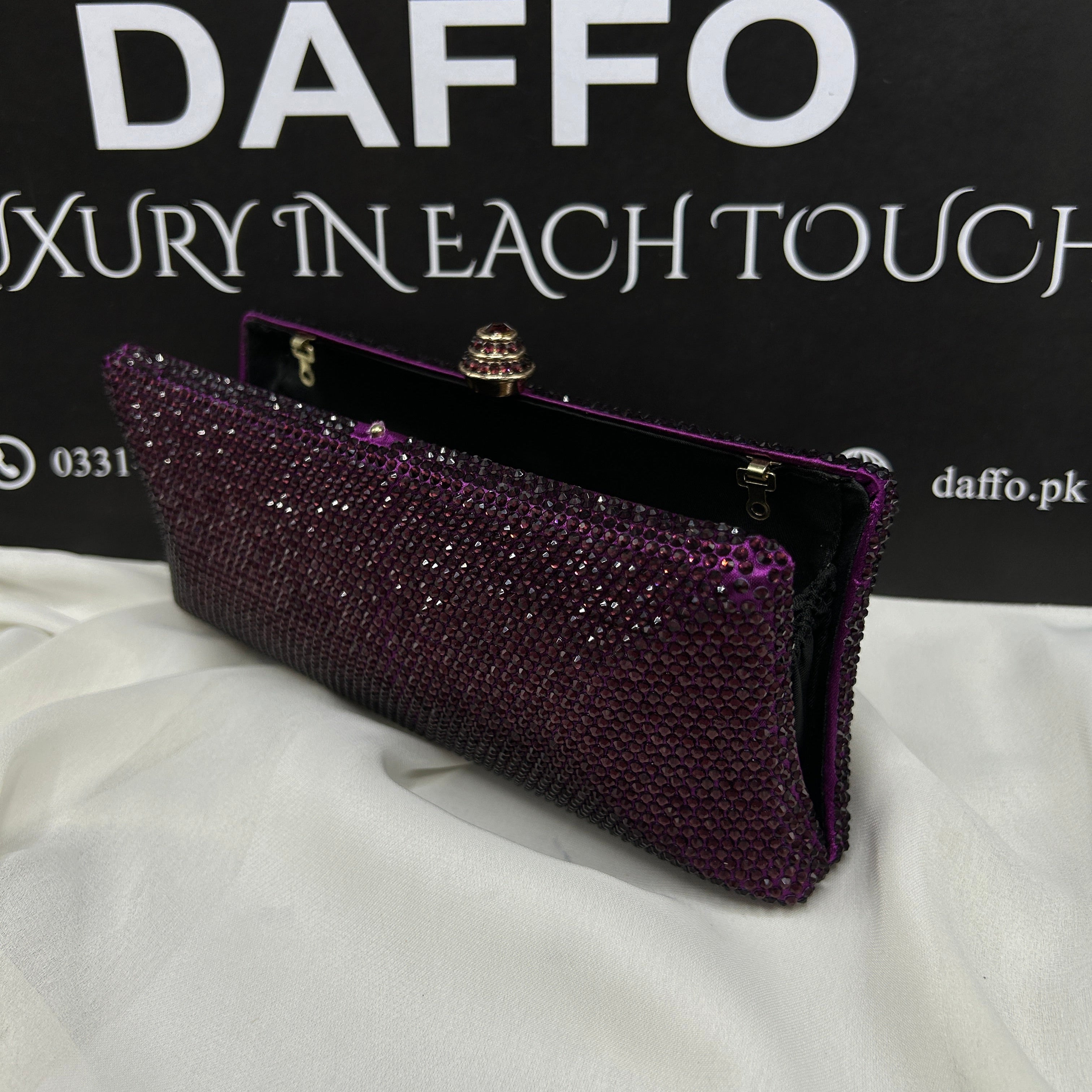 Ladies clutch with swarovski crystals all around 