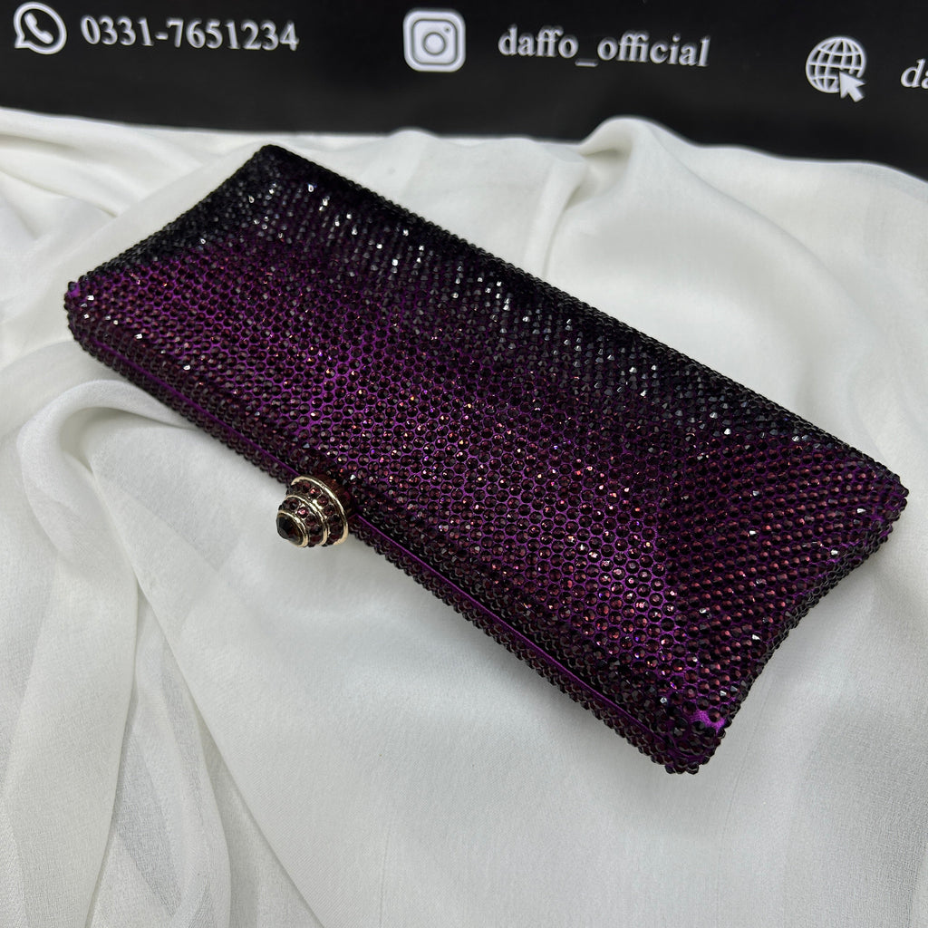 Ladies clutch with swarovski crystals all around 