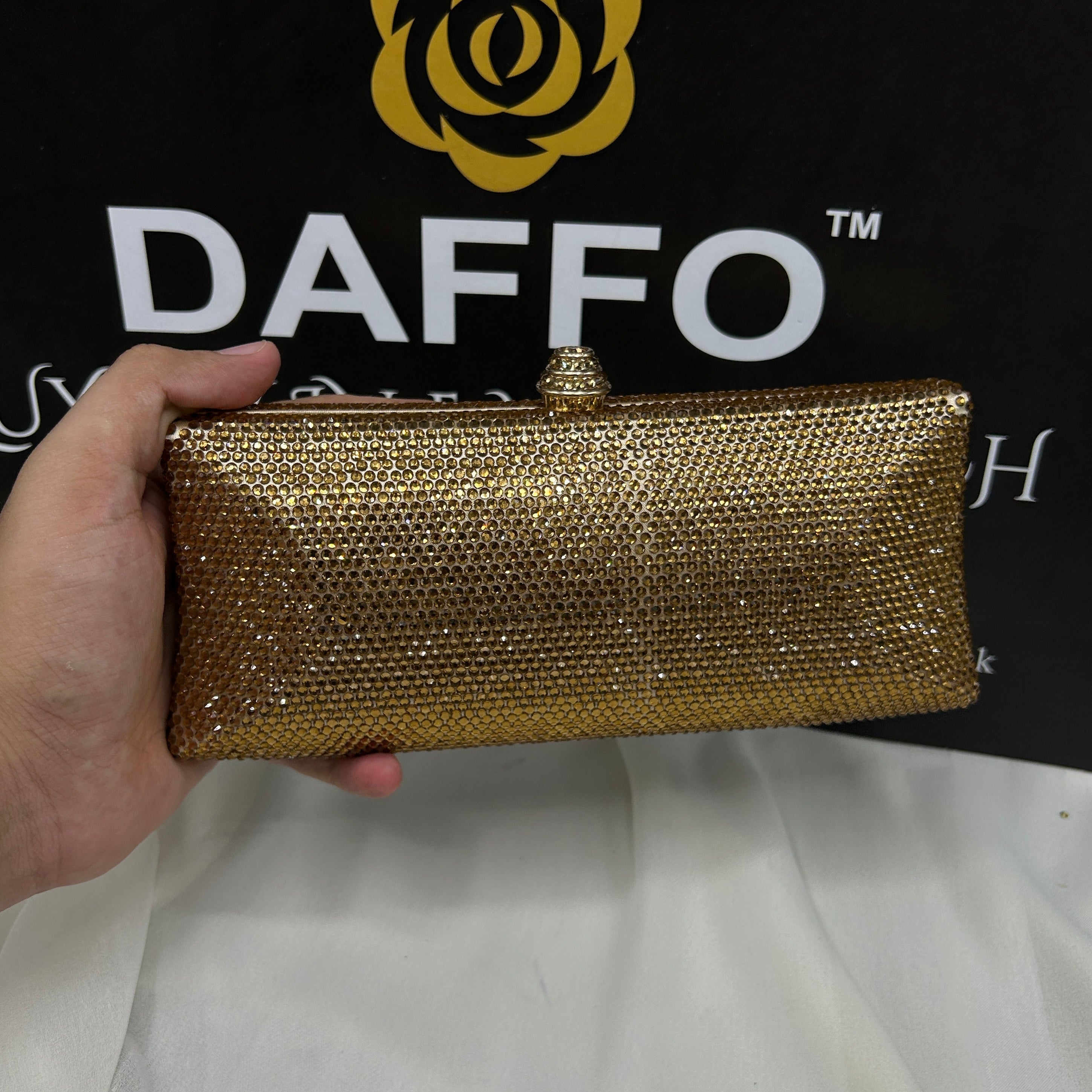 Ladies clutch with swarovski crystals all around 