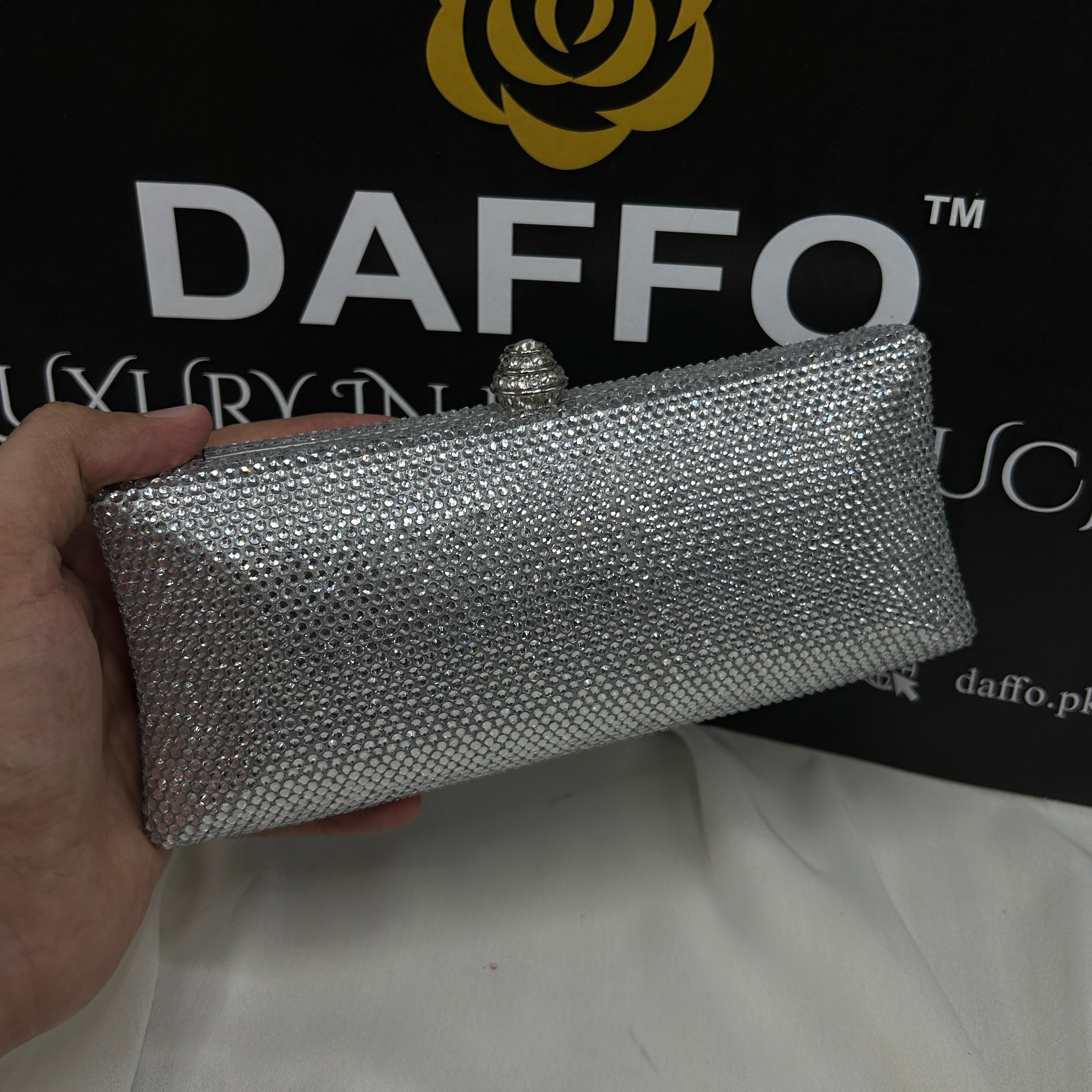 Ladies clutch with swarovski crystals all around 