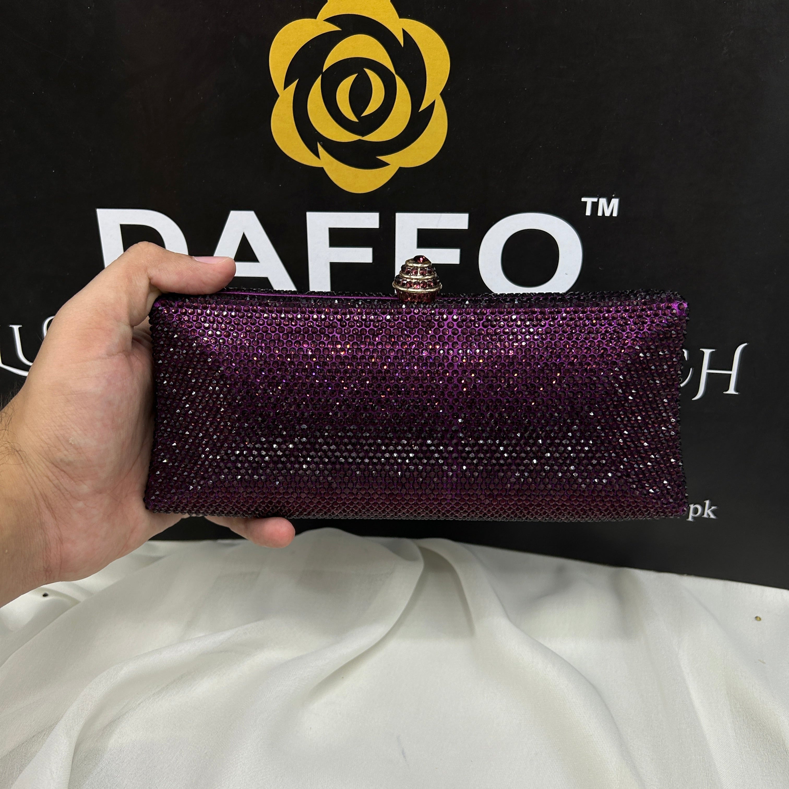 Ladies clutch with swarovski crystals all around 