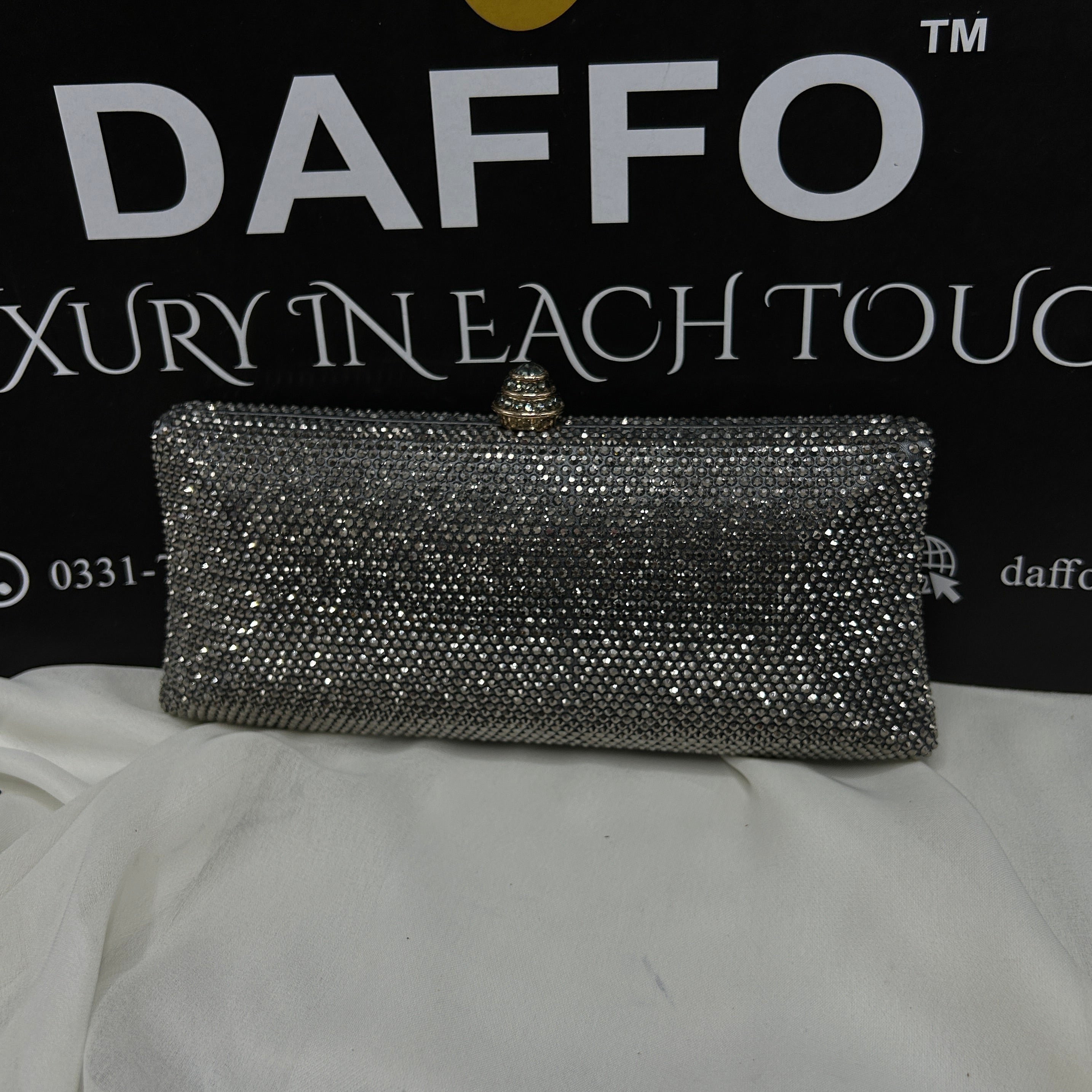 Ladies clutch with swarovski crystals all around 