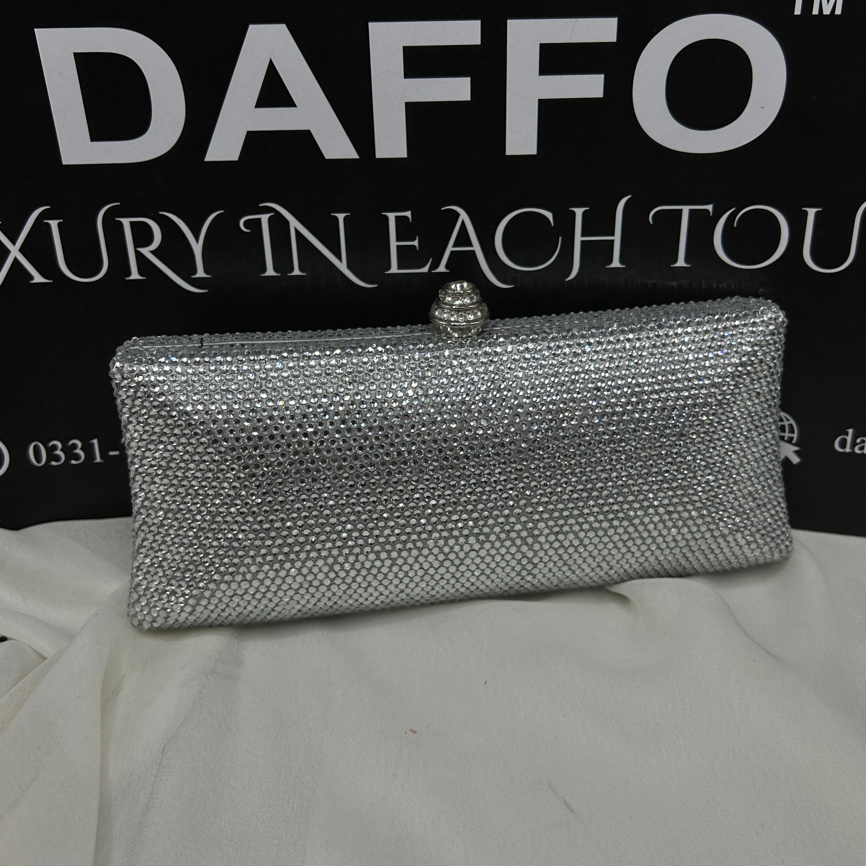 Ladies clutch with swarovski crystals all around 