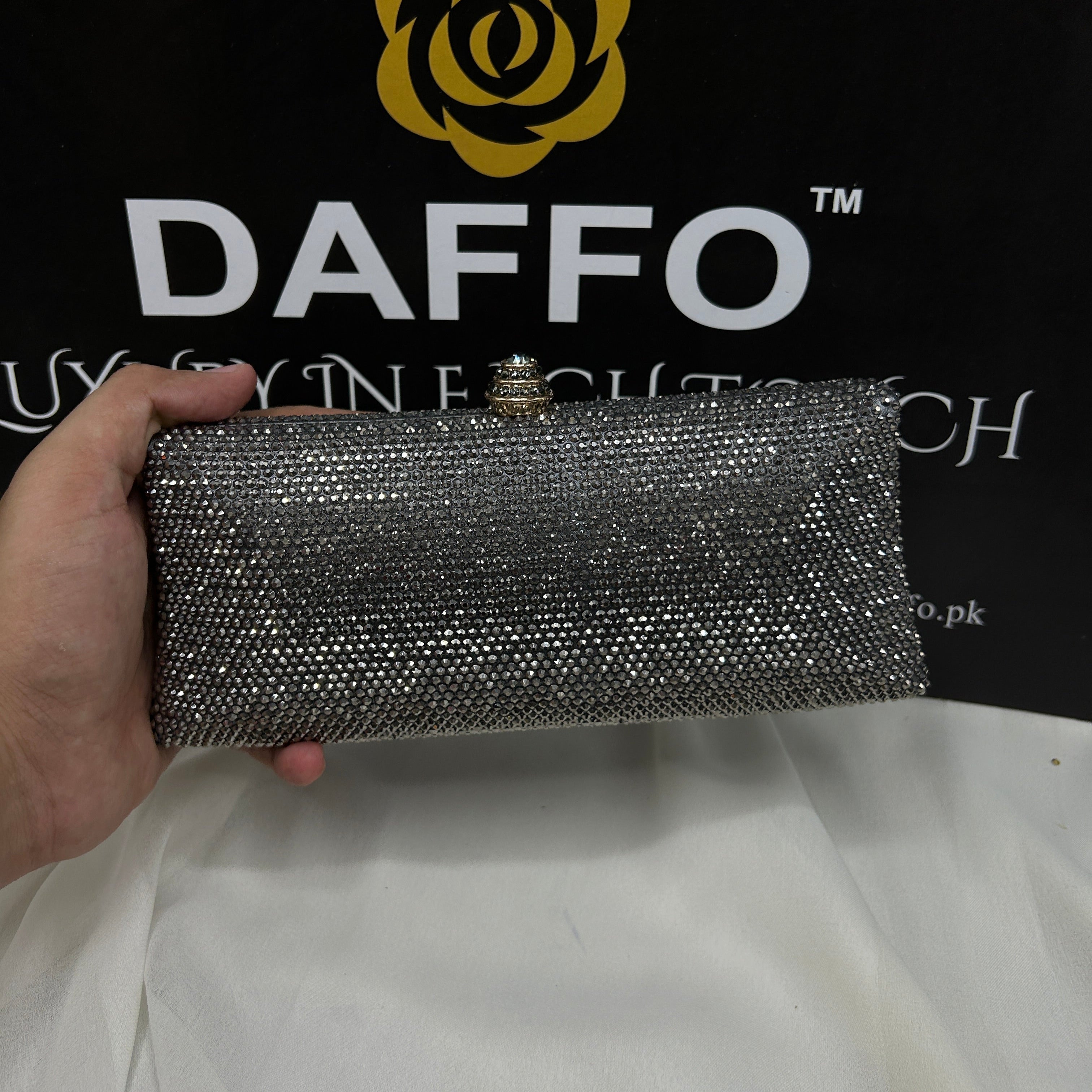 Ladies clutch with swarovski crystals all around 