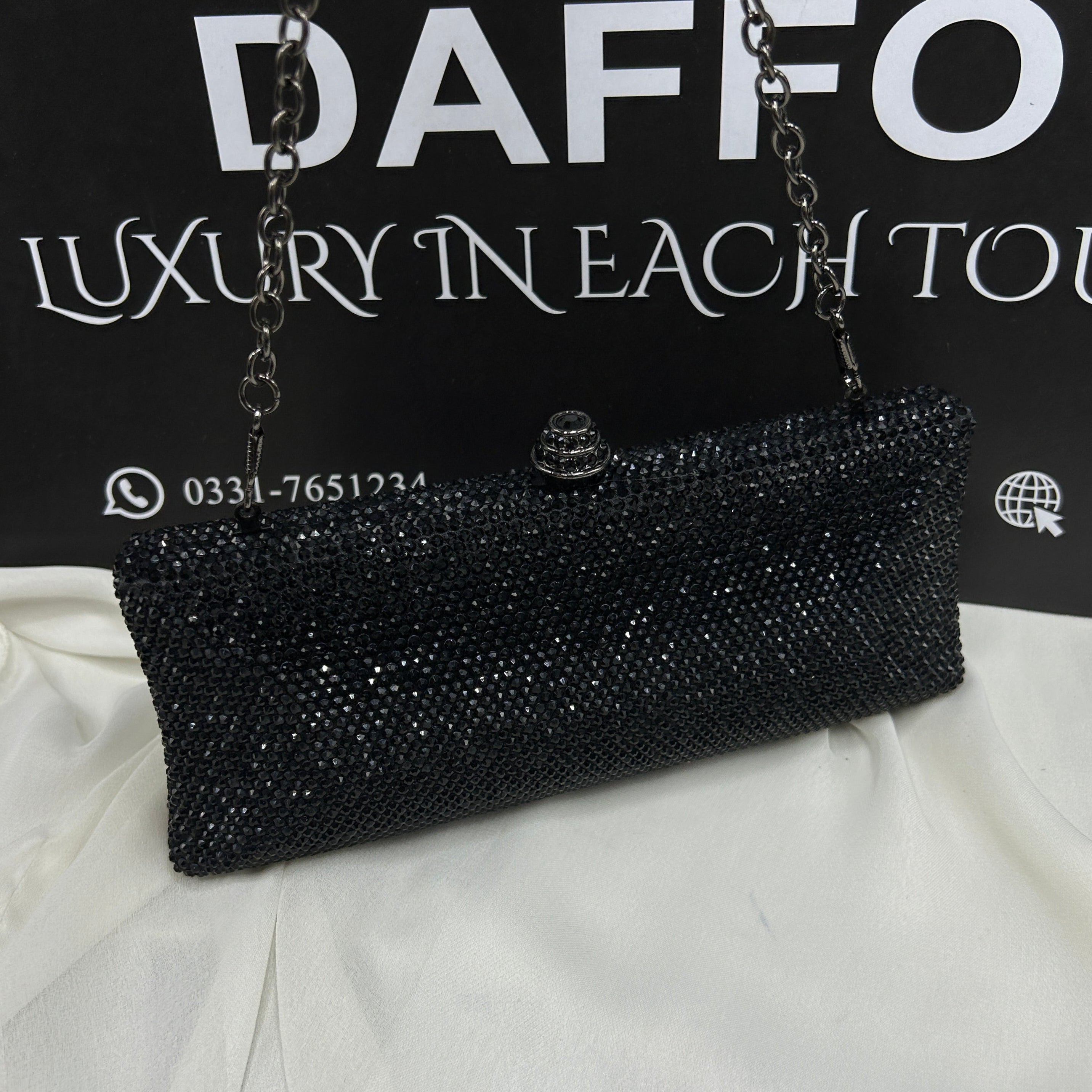 Ladies clutch with swarovski crystals all around 