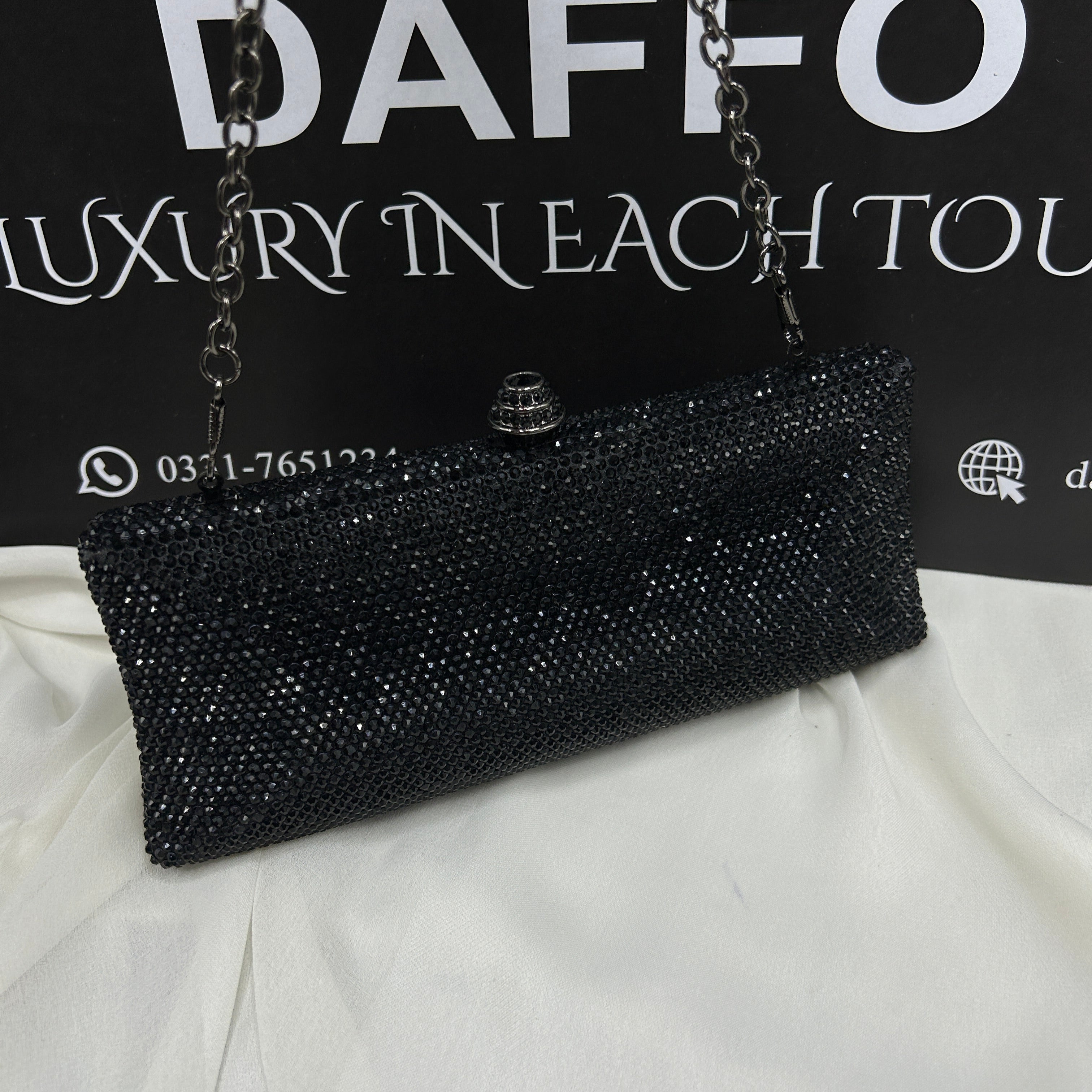 Ladies clutch with swarovski crystals all around 