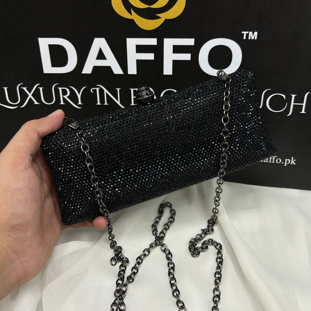 Ladies clutch with swarovski crystals all around 