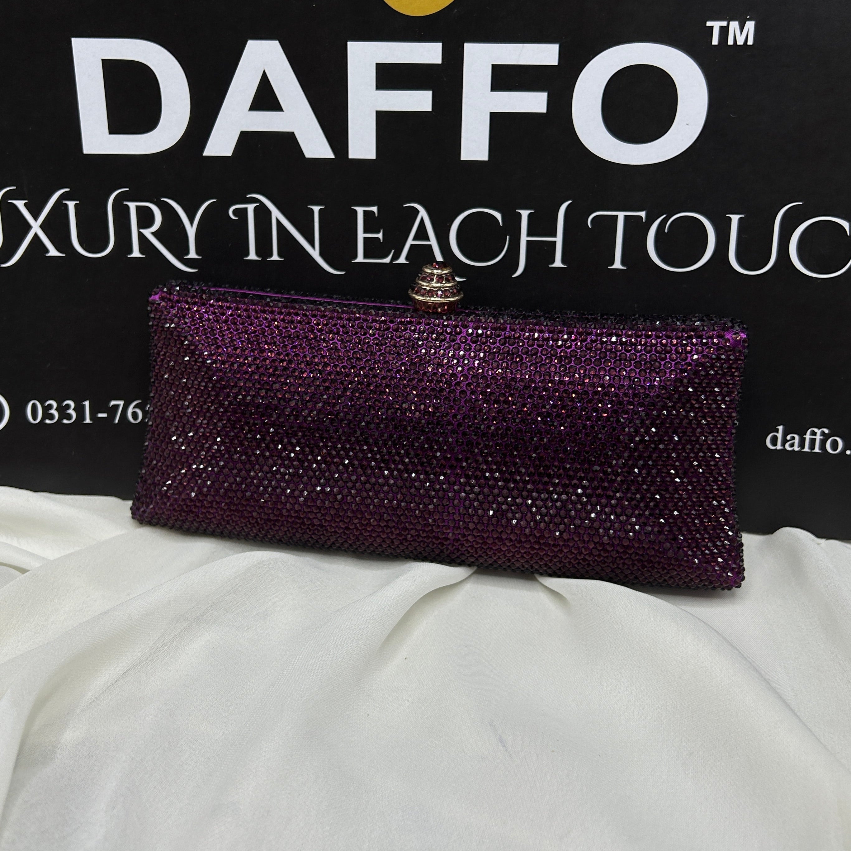 Ladies clutch with swarovski crystals all around 