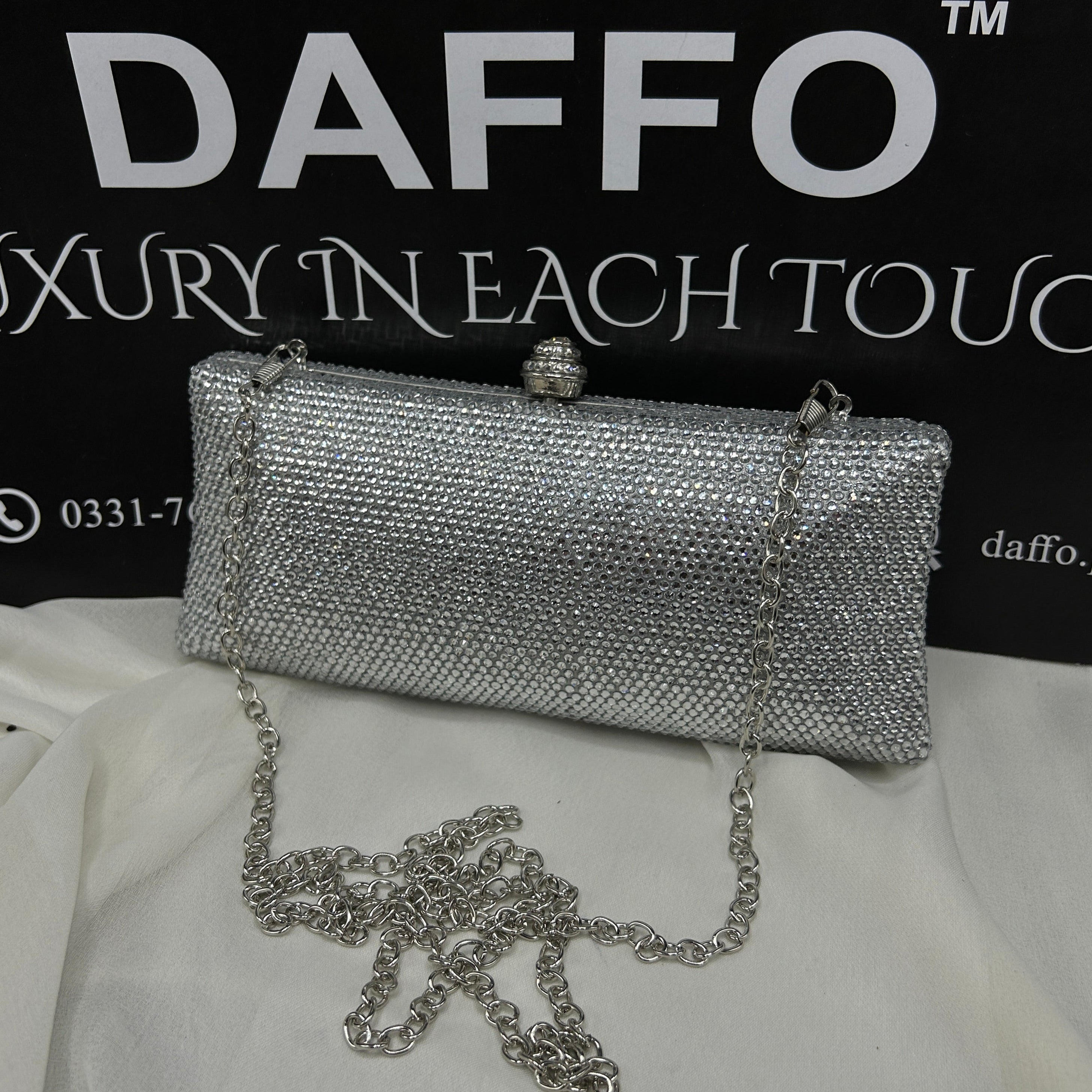 Ladies clutch with swarovski crystals all around 