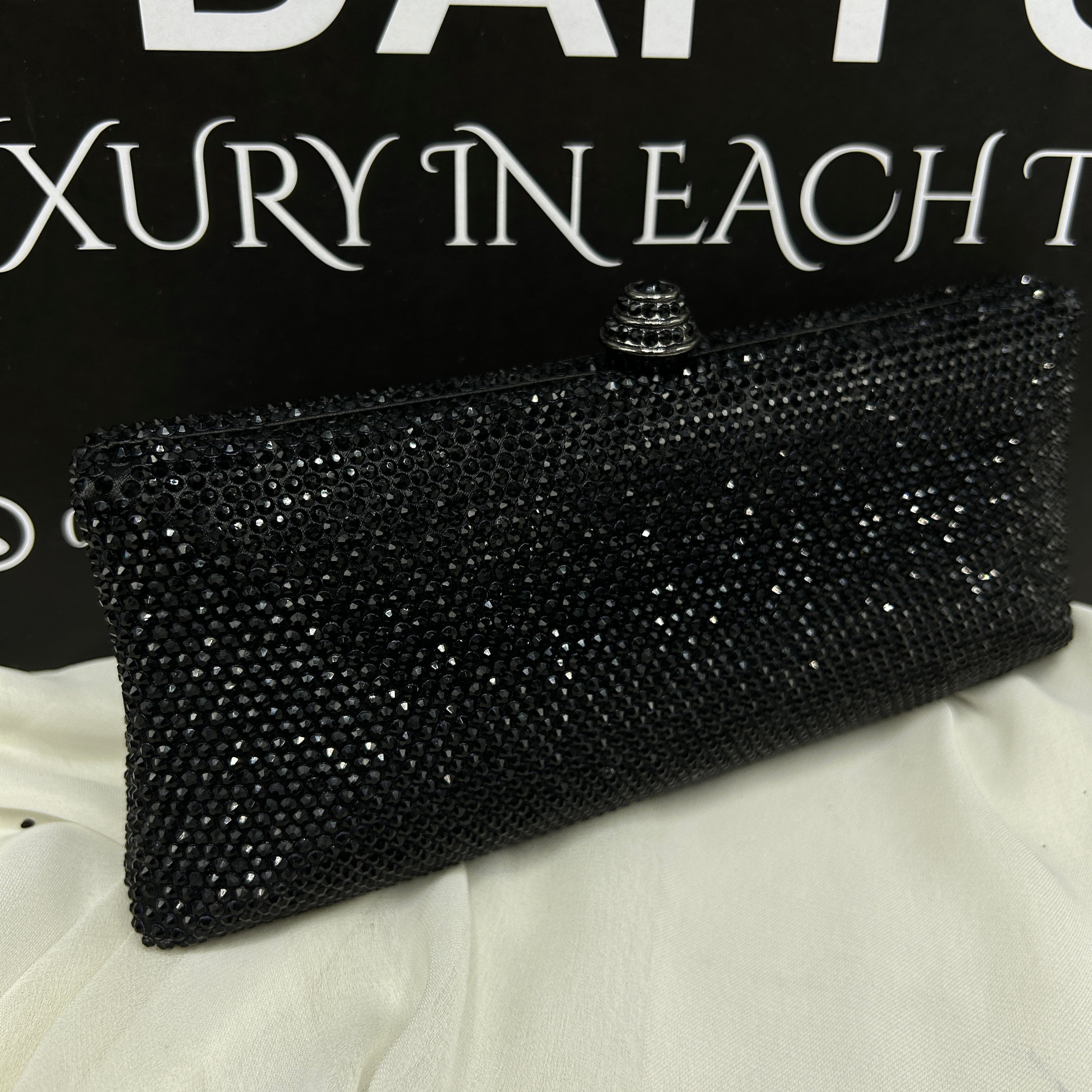 Ladies clutch with swarovski crystals all around 