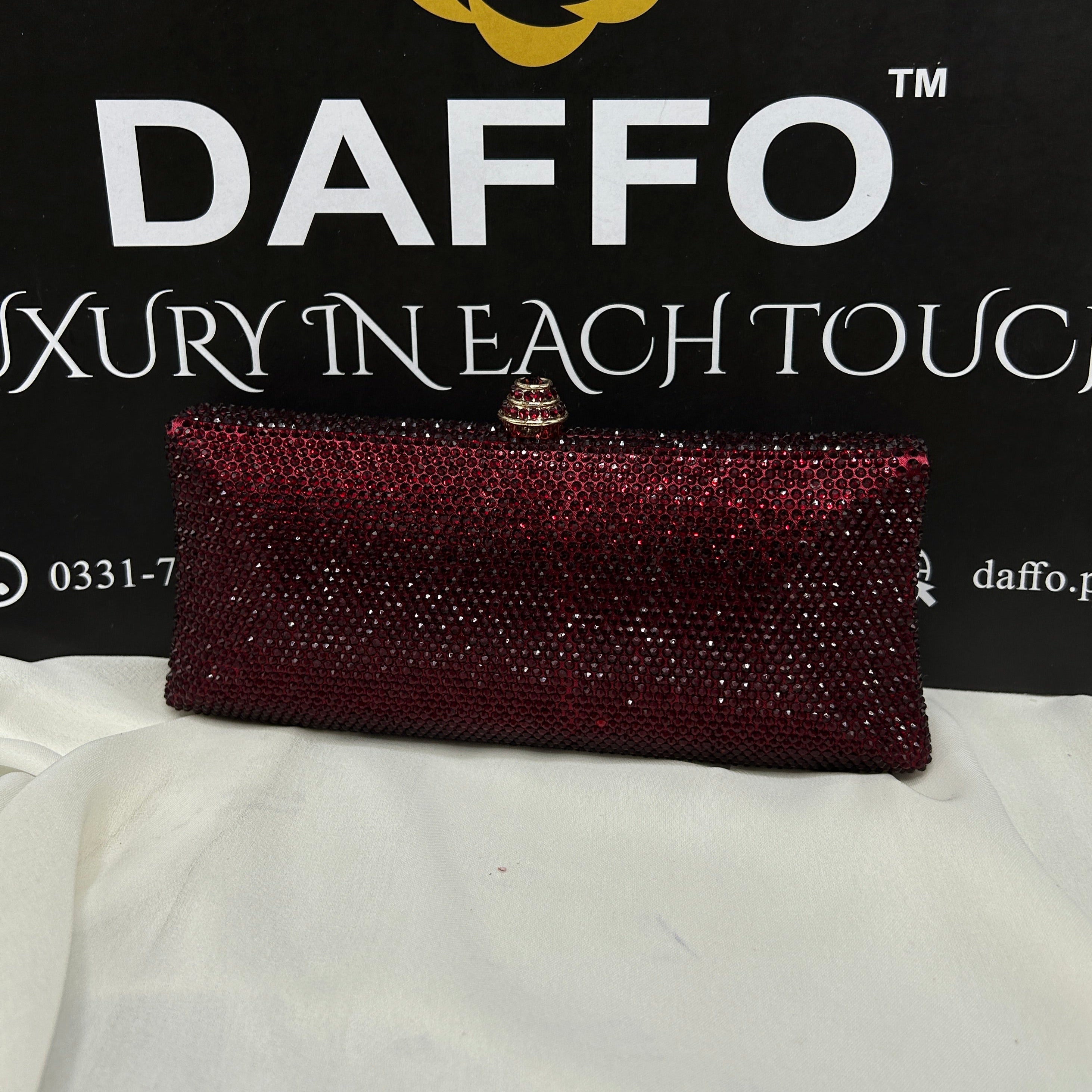 Ladies clutch with swarovski crystals all around 