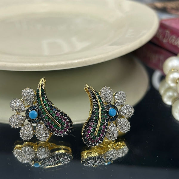 Daffo Fleha The allure of real zircons with 18K gold dip studs