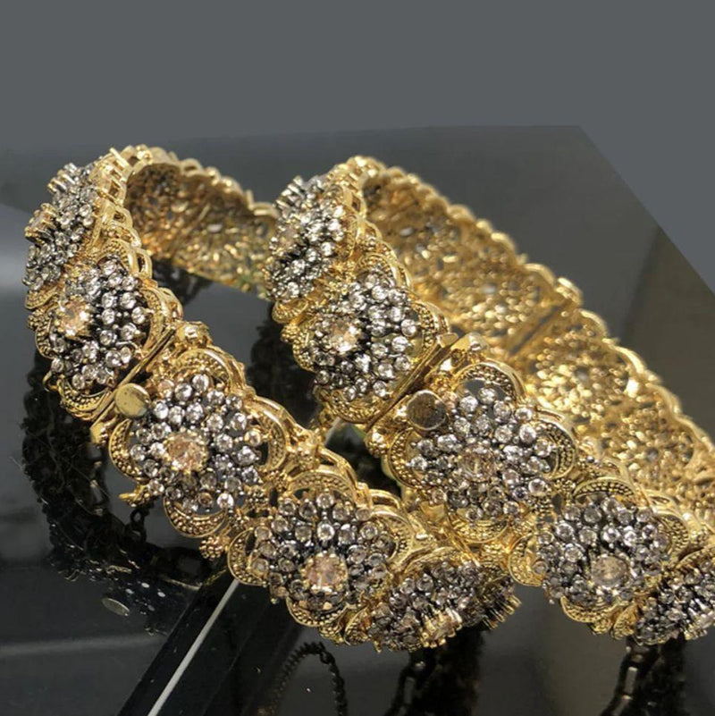 Stunning gold-plated bangles with diamond-cut stones (PAIR)