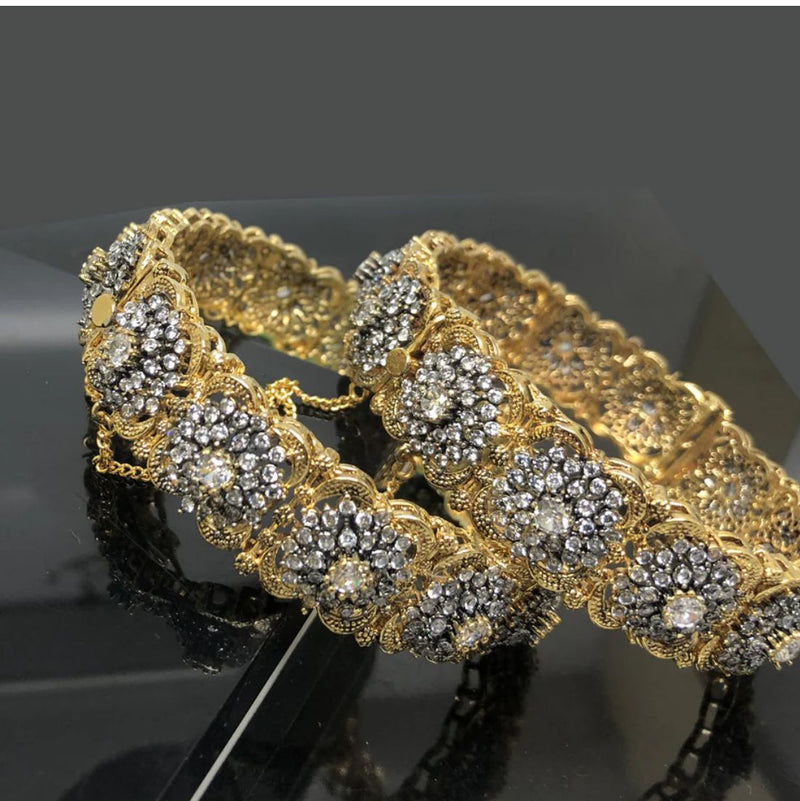 Stunning gold-plated bangles with diamond-cut stones (PAIR)